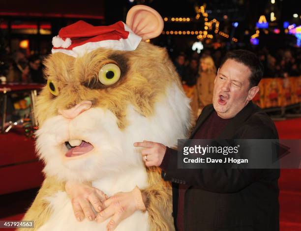 Abu the Hamster and Johnny Vegas attend "The Harry Hill Movie" World Premiere at Vue Leicester Square on December 19, 2013 in London, England.