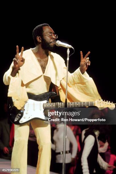 American guitarist, singer and musician Curtis Mayfield performs in front of a studio audience on the set of a pop music television show in London...