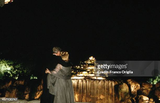42nd President of the United States Bill Clinton and first lady Hillary Clinton, pose at the 'Regia of Caserta' during a party for the G7 summit in...