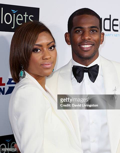 Pro basketball player Chris Paul and wife Jada Crawley attend the CP3 Foundation Celebrity Server Dinner at Mastro's Steakhouse on October 26, 2014...