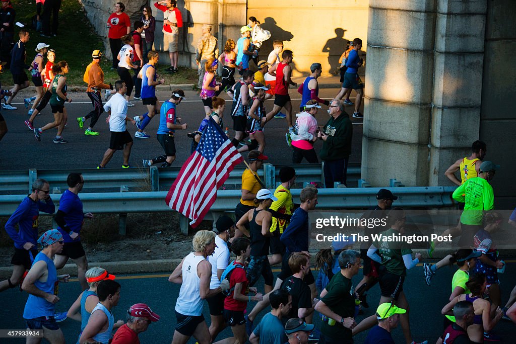 ARLINGTON, VA - OCTOBER 26:  Runners are pictured near the star