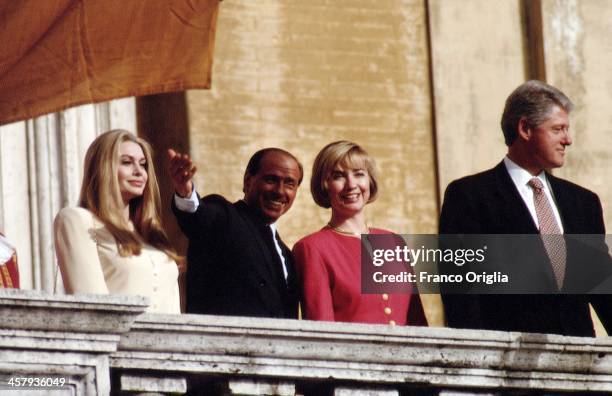 Veronica Lario, Italian Prime Minister Silvio Berlusconi, Fist Lady Hillary Clinton and 42nd President of the United States Bill Clinton wave from...