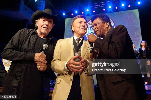 Bobby Bare, Ray Walker of The Jordanaires and Charley Pride perform during the 2014 Country Music Hall of Fame induction ceremony at Country Music...