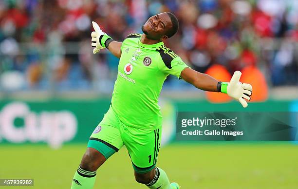 Senzo Meyiwa celebrates during the Nedbank Cup final match between Bidvest Wits and Orlando Pirates at Moses Mabhida Stadium on May 17, 2014 in...