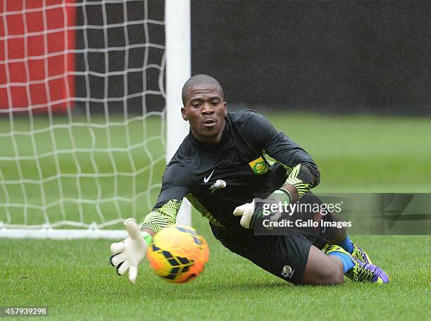 Senzo Meyiwa in action during the South African national soccer team training session and press conference at FNB Stadium on March 04, 2014 in...