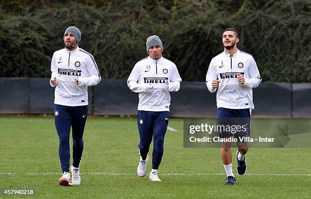 Rodrigo Palacio, Gary Medel and Mauro Icardi during FC Internazionale Training Session at Appiano Gentile on October 27, 2014 in Como, Italy.