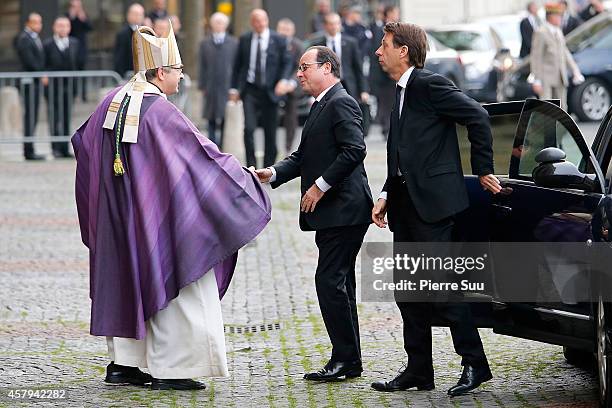 French President Francois Hollande attends the Memorial Service For Christophe De Margerie, Total CEO, at Eglise Saint-Sulpice on October 27, 2014 in...