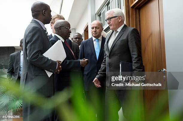 German Foreign Minister Frank-Walter Steinmeier and French Foreign Minister Laurent Fabius meet Nigerias Foreign Minister Aminu Wali on October 27,...