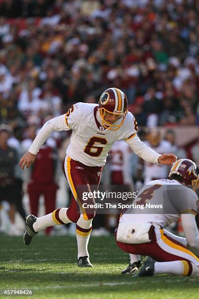 Shaun Suisham of the Washington Redskins kicks a field goal during a game against the Philadelphia Eagles on December 10, 2006 at FedEx Field in...