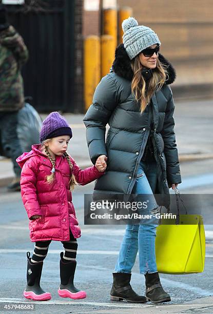 Sarah Jessica Parker and her daughter, Tabitha Broderick, are seen on December 19, 2013 in New York City.