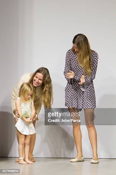 Designer Ali Mejia and Mariela Rovito attend the Eberjey show during petitePARADE Kids Fashion Week, Miami October 2014 at The Moore Building on...