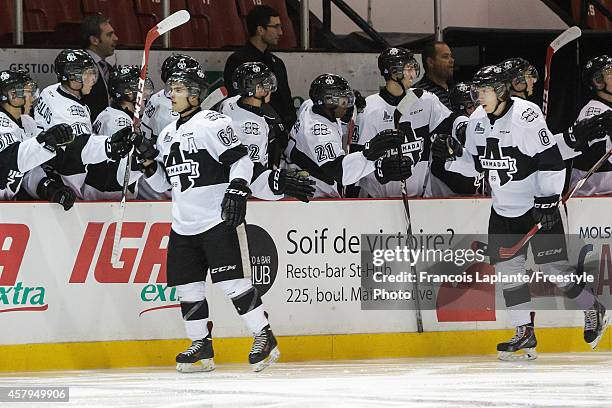 Danick Martel and Emil Aronsson of the Blainville-Boisbriand Armada celebrate a goal at the bench against the Gatineau Olympiques on October 1, 2014...