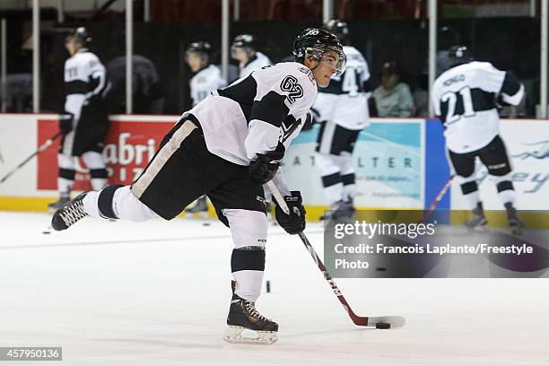 Danick Martel of the Blainville-Boisbriand Armada fires a shot during warmup prior to a game against the Gatineau Olympiques on October 1, 2014 at...