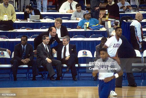 Final Four: North Carolina coach Dean Smith with Kansas coach Roy Williams on bench before game at Hooiser Dome. Indianapolis, IN 3/30/1991 CREDIT:...
