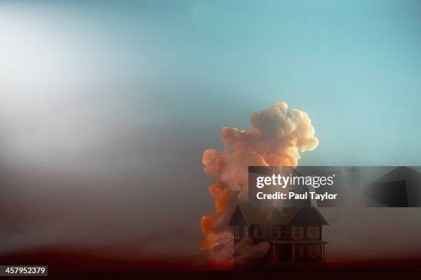submerged house - burning stockfoto's en -beelden