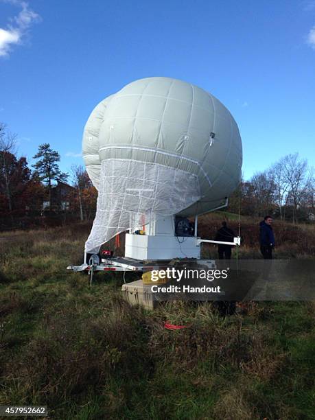 In this handout provided by the Pennsylvania State Police, a large Mylar surveillance balloon that is being used in the search for suspected killer...