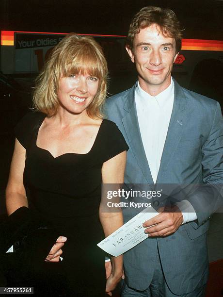 Canadian American actor Martin Short with his wife Nancy Dolman at the premiere of the film 'Far And Away', 1992.