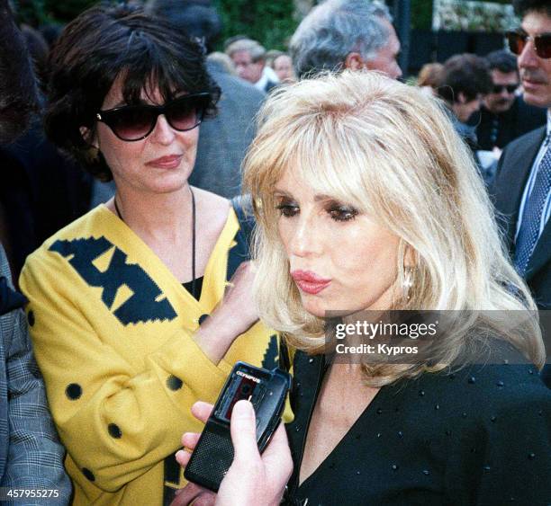 Singer Nancy Sinatra and Tina Sinatra, daughters of singer Frank Sinatra, circa 1995.