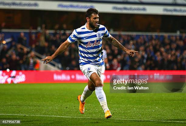 Charlie Austin of QPR celebrates scoring the opening goal during the Barclays Premier League match between Queens Park Rangers and Aston Villa at...