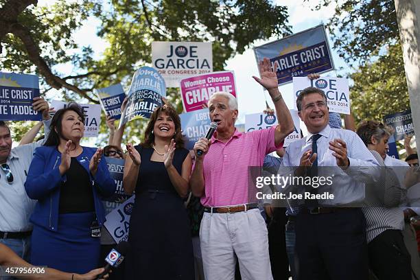 Former Florida Governor and now Democratic gubernatorial candidate Charlie Crist stands with Annette Taddeo his nominee for Lieutenant Governor and...