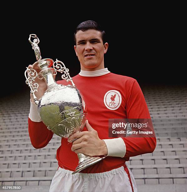 Ron Yeats of Liverpool with the 1965/66 League Division One trophy at Anfield, Liverpool, circa 1966.
