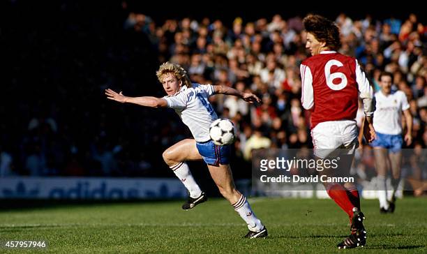 Wwest Ham striker Frank McAvennie turns Arsenal defender Tony Adams during a League Division One match between Arsenal and West Ham United at...