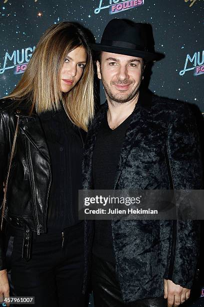 Michael Youn and his wife Isabelle Funaro attend "Mugler Follies" Paris New Variety Show - Premiere on December 19, 2013 in Paris, France.