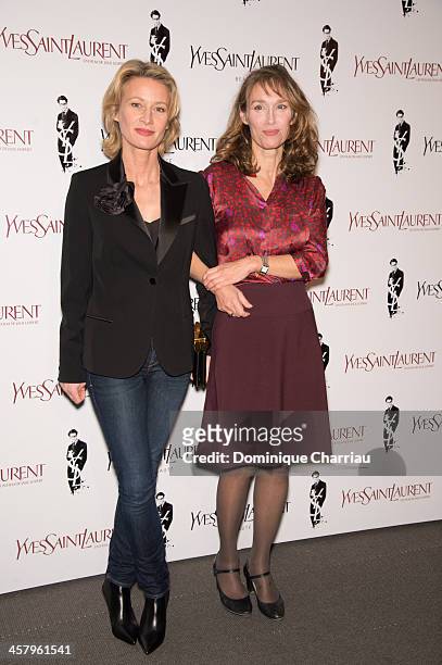 Astrid Whettnall and Marianne Basler attend the 'Yves Saint Laurent' Paris Premiere at Cinema UGC Normandie on December 19, 2013 in Paris, France.