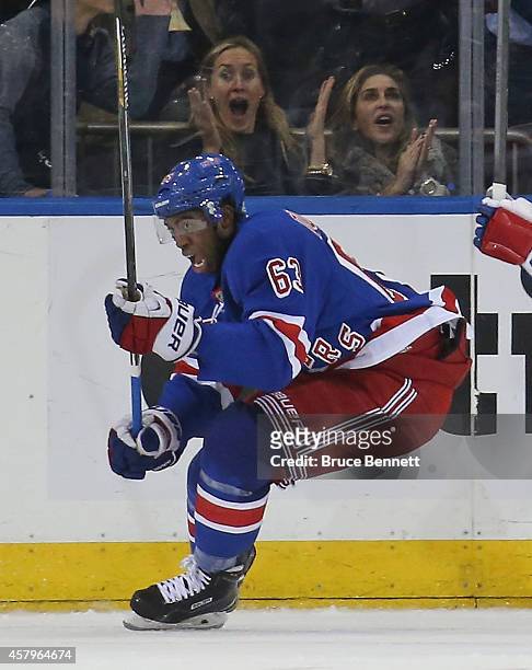 Anthony Duclair of the New York Rangers celebrates his first NHL goal at 16:12 of the third period against the Minnesota Wild at Madison Square...