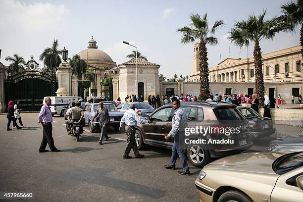 Police forces stand guard in front of Cairo University as students enter the campus on October 27, 2014 in Cairo, Egypt.