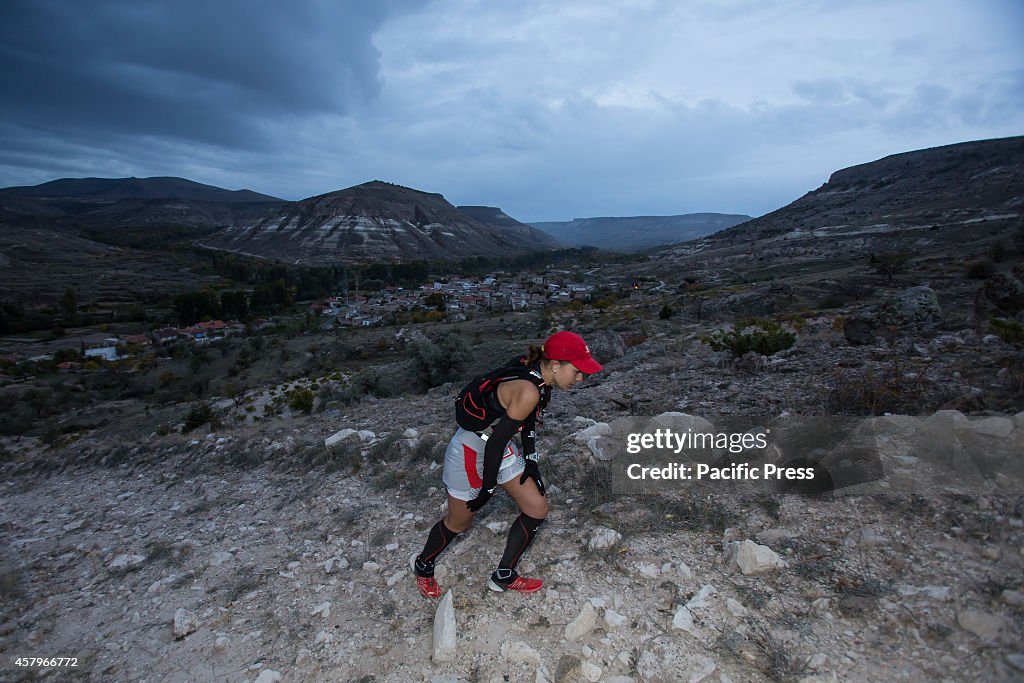 Russian runner Elena Polyakova leads the 110 km race at the...