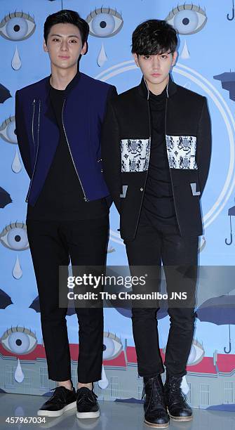 Min-Hyun and REN of NU'EST attend the 2015 S/S Seoul Fashion Week "Kwak Hyunjoo" collection at DDP on October 21, 2014 in Seoul, South Korea.