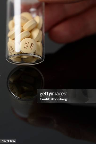 Avigan influenza tablets, produced by Fujifilm Holdings Corp., are arranged for a photograph at the company's headquarters in Tokyo, Japan, on...