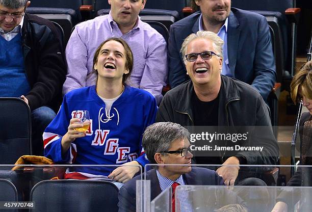 Miles Robbins and Tim Robbins attend the Minnesota Wild vs New York Rangers game at Madison Square Garden on October 27, 2014 in New York City.