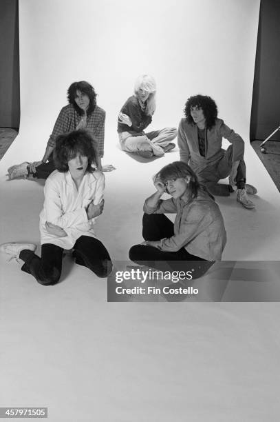 Posed studio group shot portrait of English group Japan in London in 1978. Clockwise from top left: Steve Jansen, David Sylvian, Rob Dean, Mick Karn...