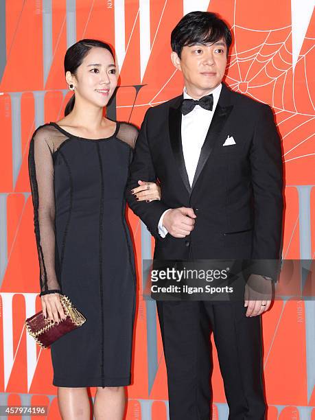 Lee Yoon-Jin and Lee Beom-Soo pose for photographs during the W Korea campaign "Love Your W" party at Fradia on October 23, 2014 in Seoul, South...