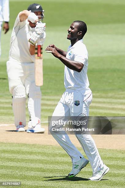 Darren Sammy of the West Indies celebrates after claiming the wicket of Hamish Rutherford during day two of the Third Test match between New Zealand...