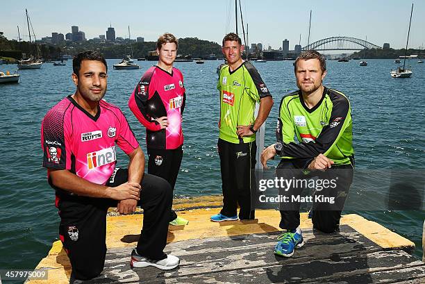 Ravi Bopara and Steve Smith of the Sixers and Mike Hussey and Dirk Nannes of the Thunder pose during a joint Sydney Thunder and Sydney Sixers Big...