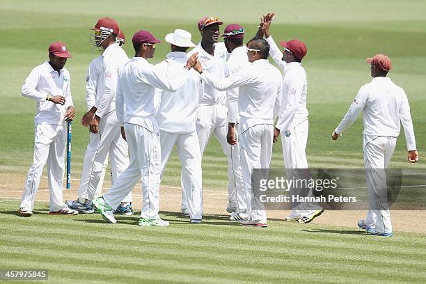 The West Indies celebrate the wicket of Peter Fulton of New Zealand during day two of the Third Test match between New Zealand and the West Indies at...