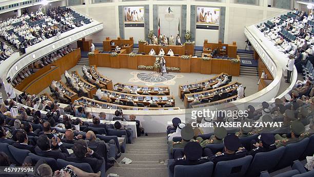 General view shows Kuwaiti members of parliament attending the opening session of the new parliamentary term in Kuwait City on October 28, 2014....