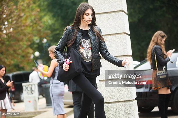 Italian model Serena Archetti exits Roberto Cavalli in a Marcelo Burlon County of Milan top on Day 4 of Milan Fashion Week Spring/Summer 2015 on...