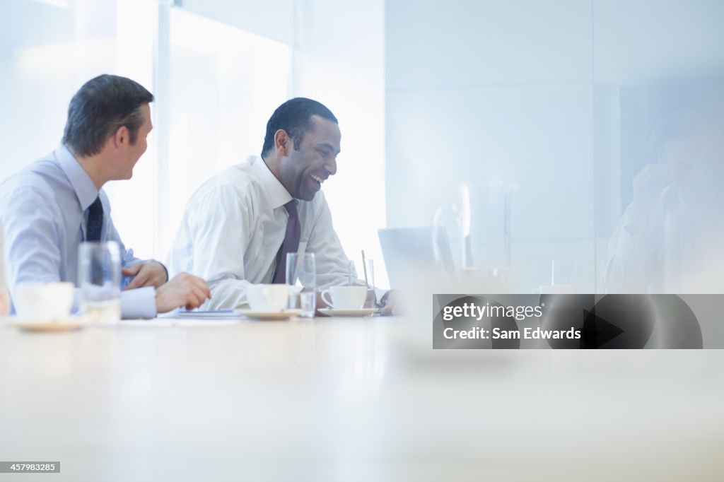 Businessmen talking in meeting