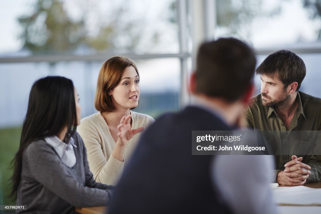 Business people talking in meeting