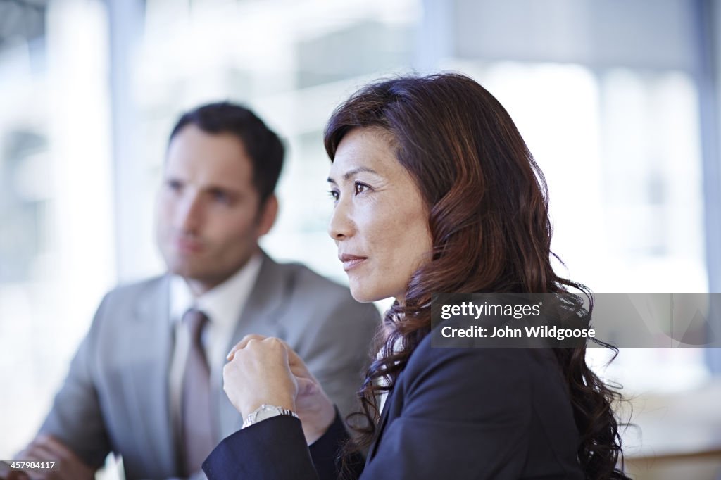 Business people talking in meeting