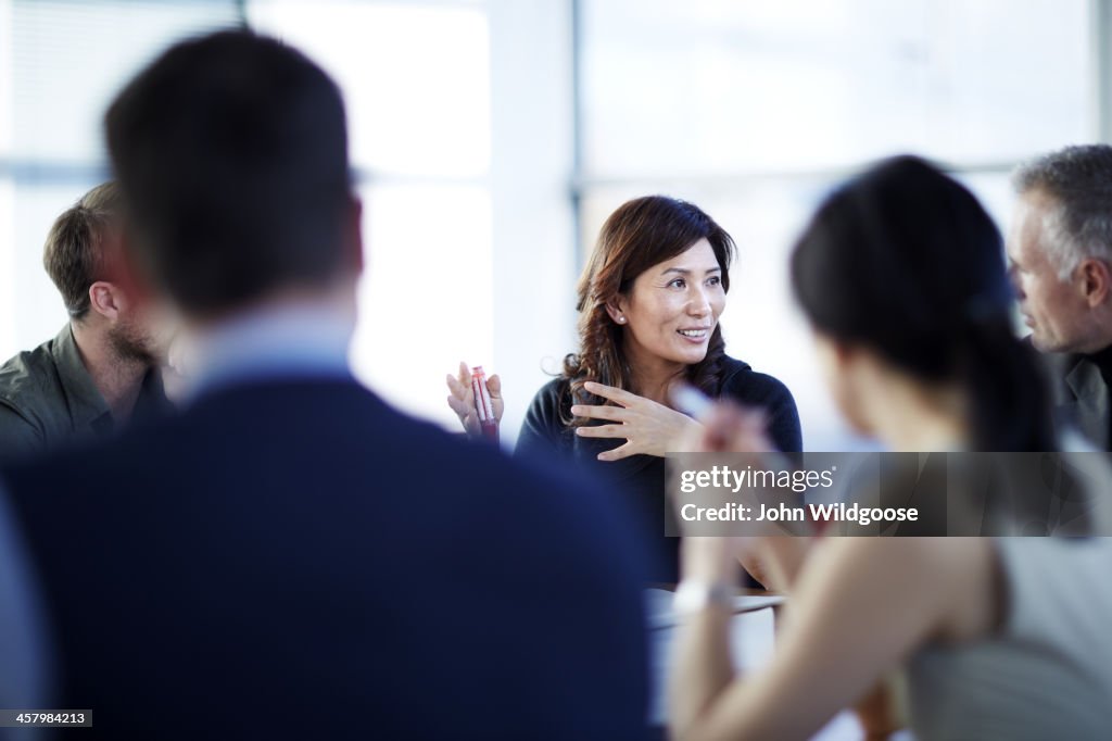 Business people talking in meeting