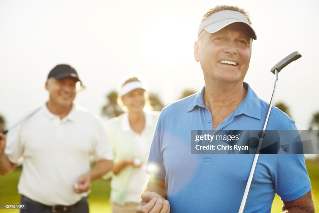 Senior adults on golf course
