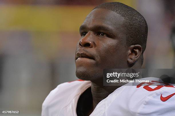 Frank Gore of the San Francisco 49ers watches from the sidelines during a game against the St. Louis Rams at the Edward Jones Dome on October 13,...