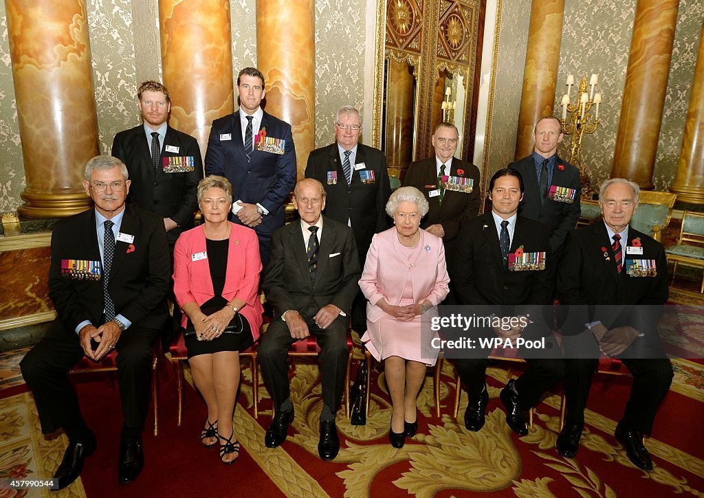 Queen Elizabeth II Hosts Victoria And George Cross Reception At Buckingham Palace