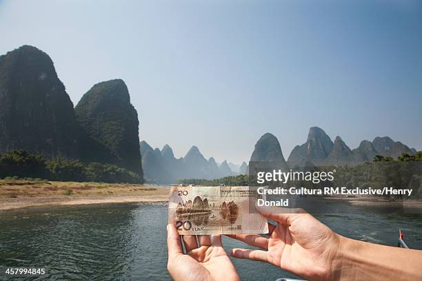 li river scenery shown on the back of the 20 yuan bank note, between xingping and yucun on the li river, guilin, china - 20 yuan note stock pictures, royalty-free photos & images