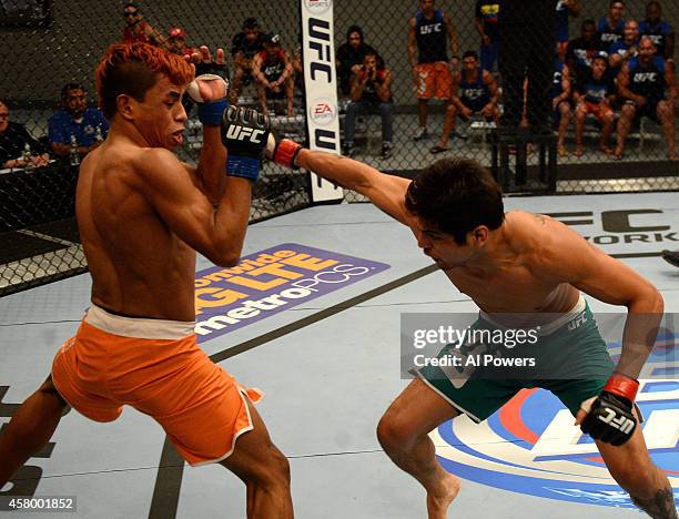 Team Velasquez fighter Gabriel Benitez punches team Werdum fighter Leonardo Morales in their semifinal fight during filming of The Ultimate Fighter...